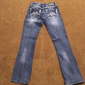Miss me jeans.  Size 28 signature-rise bootcut.  32 inch inseam.